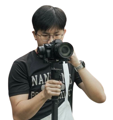 Ryan filming with his camera